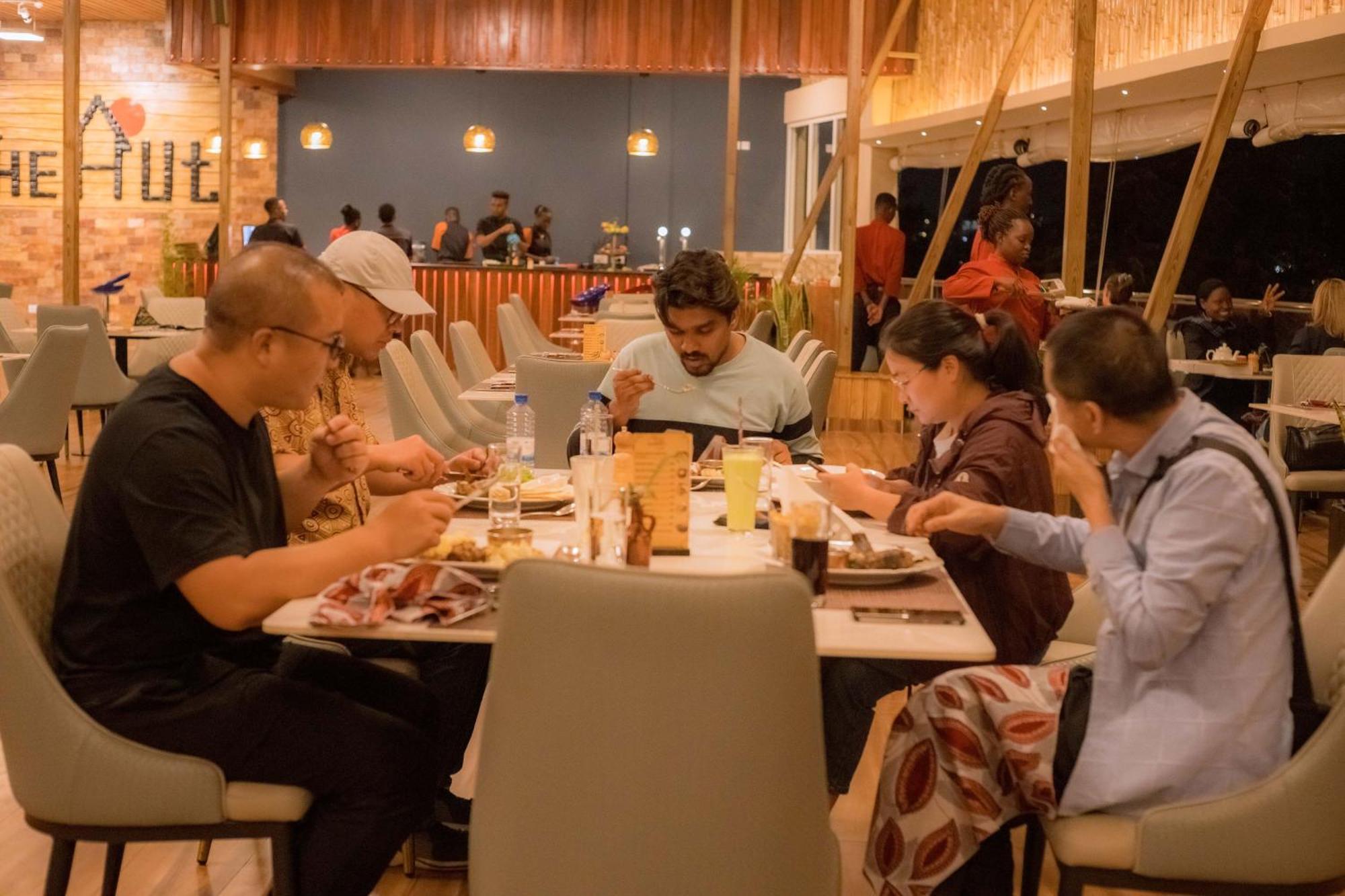 The Hut Restaurant & Boutique Hotel Kigali Exterior photo