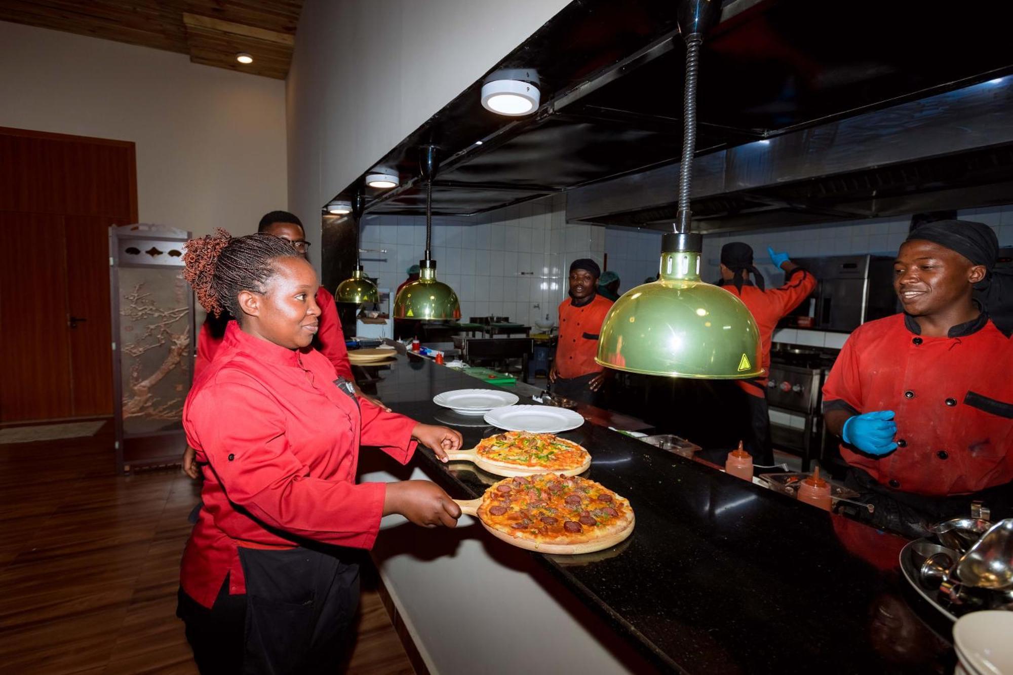 The Hut Restaurant & Boutique Hotel Kigali Exterior photo